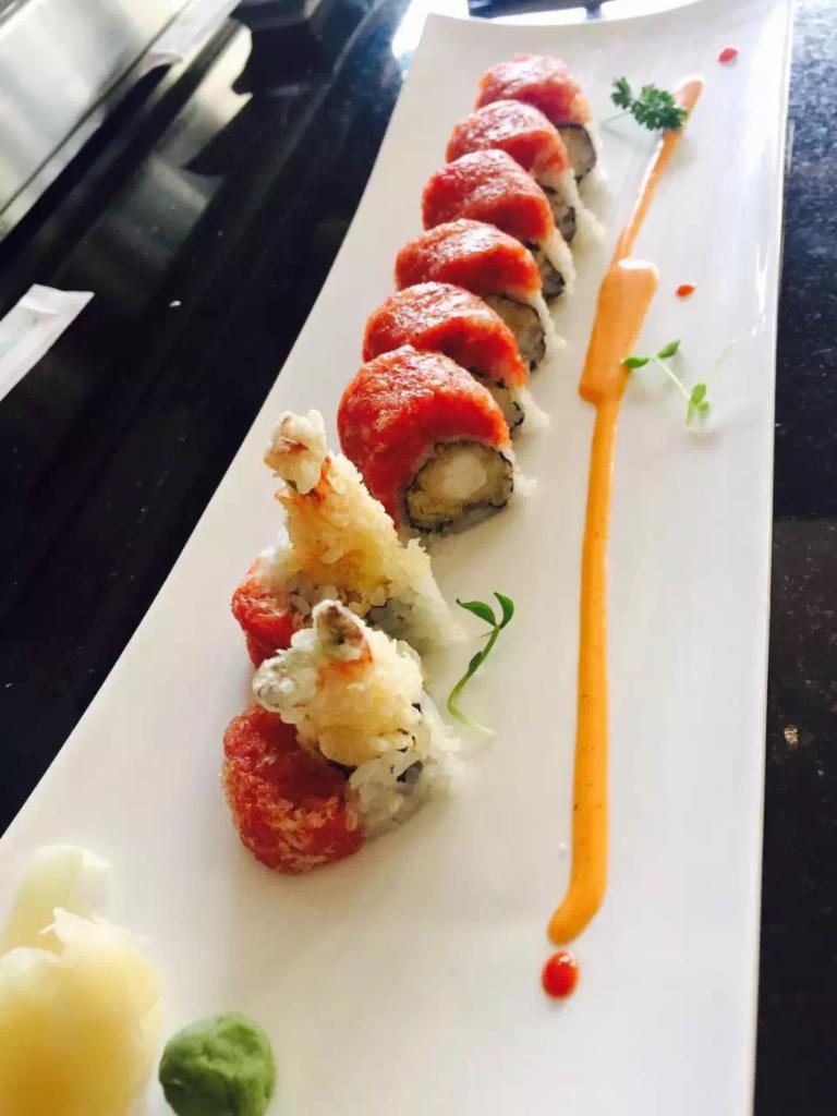 Red Hot Dragon Roll · Shrimp tempura inside, topped with spicy tuna and crunch.