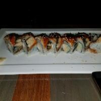 Crazy Dragon Roll · Shrimp tempura and cucumber, topped with eel and avocado.