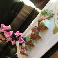 Tuna Salmon Twister Roll · Crunch spicy salmon and sweat peanut, topped with Japanese spicy crusted tuna and avocado.
