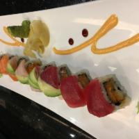 Angel Roll · Crunch spicy salmon roll, topped with tuna, salmon, yellowtail and avocado.