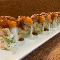 Alaska Specialty Roll · 8 pieces. Avocado, crab salad, and shrimp tempura inside, topped with spicy salmon and teriy...