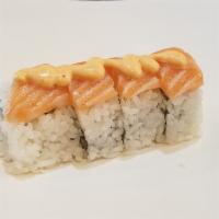 New York Roll  · 4 pieces. Crab salad, cream cheese, topped with salmon, spicy mayo and masago. Raw.
