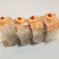 Jess Roll · 4 pieces. Crab salad inside topped with ebi, spicy mayo, and Sriracha.