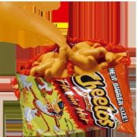 CHEETOS WITH CHEESE / CHETOS CON QUESO  · Flaming hot Cheetos with Hot Yellow Cheese. / Chetos Picosos with Queso Amarillo Derretido.
