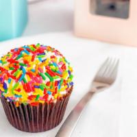 Confetti Dozen · Vanilla cake, buttercream mixed with sprinkles, and topped with sprinkles.