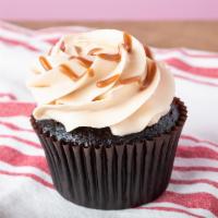 Salted Caramel Dozen · Chocolate cake with caramel buttercream frosting, drizzled with caramel, and sprinkled with ...