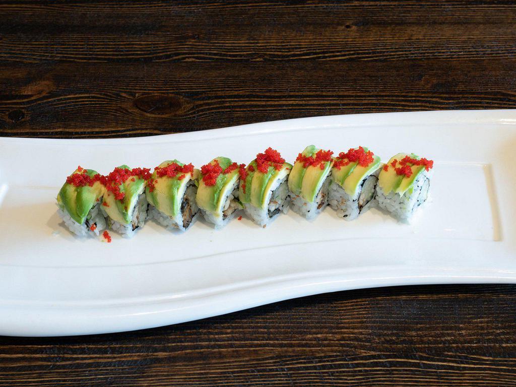 Dragon Roll · Inside: eel and cucumber. Outside: avocado, tobiko and eel sauce.