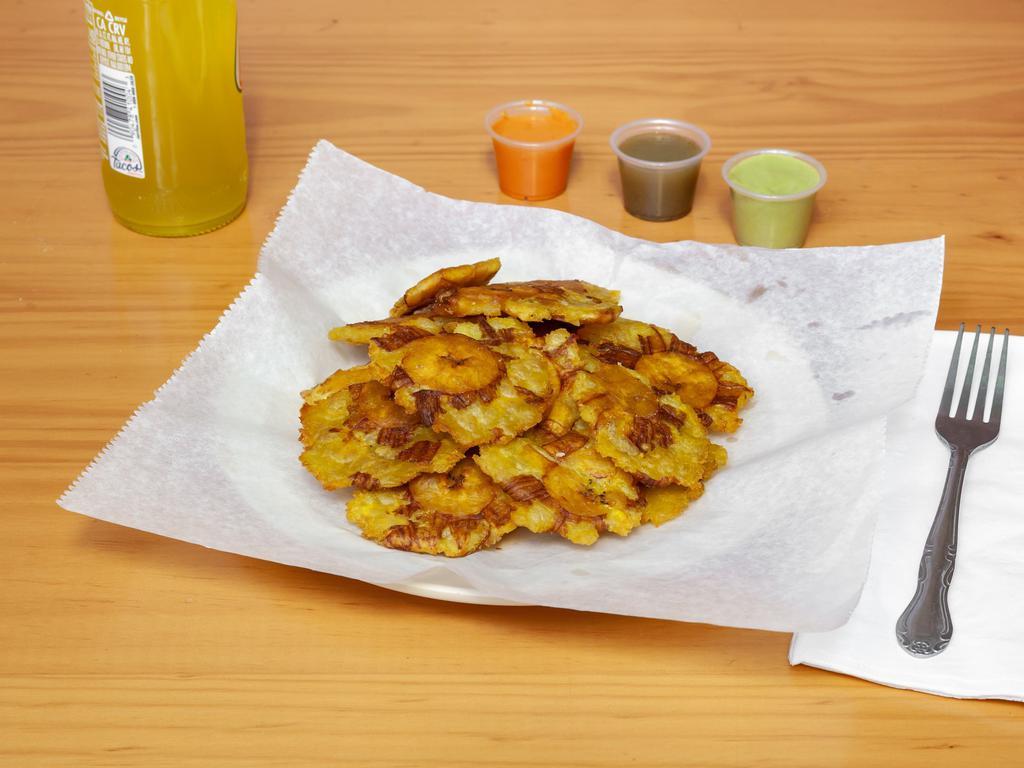 Tostones · Plantains that have been smashed and fried 