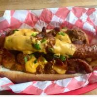 Fry Dog · Steak fries on this hot dog aren't the only good thing. There are bacon strips, avocado, som...
