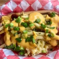 Mac Dog · Attack of the mac is back with our bacon strips, mac and cheese, shoestring fries, and queso...