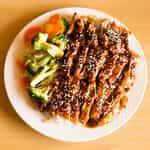 Teriyaki Chicken Plate · Served with steamed rice, veggies (broccoli, cabbage, and carrots), teriyaki chicken, sesame...
