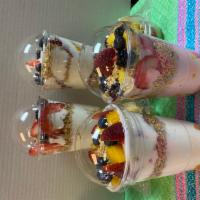 Yogurt Parfait · 16 oz of yogurt mixed with granola,Strawberry,mango,blue berries,black berries. 
Your choice...