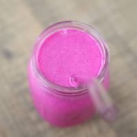 Dragon fruit smoothie · Cold refreshing drink with dragon fruit, mango and banana.