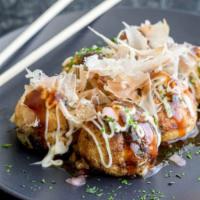 Takoyaki · 6 pieces. Japanese fried octopus ball with chef special sauce.