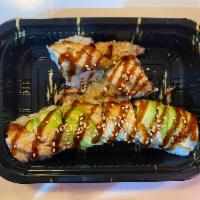 Black Dragon Roll · Shrimp tempura inside with eel and avocado on top, topped off withh eel sauce and sesame.