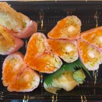 Pink Lady Roll · Shrimp tempura, lobster salad, eel and mango in soy paper.