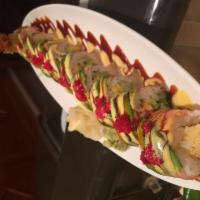 Lobster Dragon Roll · Tempura fried lobster tail, mango, cucumber, wrapped with soy paper, top with avocado.