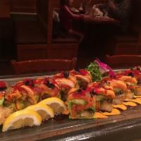 Dragon Special Sashimi Roll · Spicy tuna, avocado, shrimp tempura, eel and seaweed salad in soy paper, tuna, salmon, & whi...