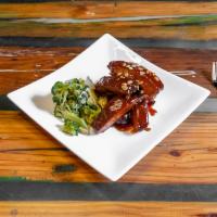 Sticky Fingers Ribs  · Baby back ribs, sweet and tangy BBQ sauce, toasted peanut and scallion.