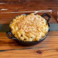 Mac N Cheese Skillet  · Melted cheese sauce, cavatappi pasta, bread crumbs.