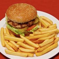 Turkey Burger Deluxe · Served with lettuce, tomato, pickle and french fries.