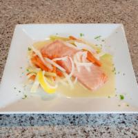 Salmon Affogato · Fillet of salmon from Faroe Island with carrots, onions and celery in a white wine lemon sau...