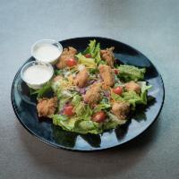 Original Rex's Salad · Fresh greens topped with Rex's Original, Grilled or Jalapeño chicken, tomato, red onion, che...