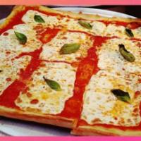 Grandma Pizza with Fresh Basil, Garlic and Mozzarella · Our #1 selling pizza at Villa Rustica