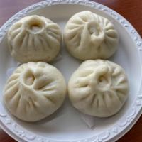 34d. Steamed Pork Buns · Served with 4 pieces.