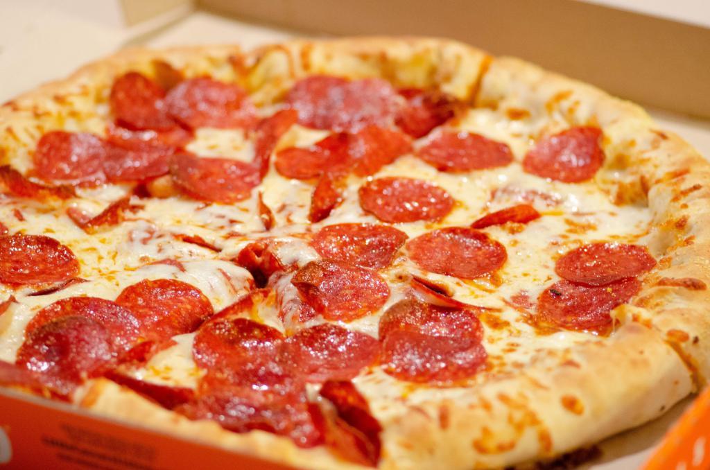 Pepperoni Pizza · Pizza crust topped with Pepperoni, mozzarella cheese, and pizza sauce 