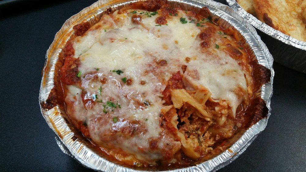 Lasagna · Fresh ground beef, ricotta cheese and topped with mozzarella.