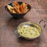 Spicy Pita & Guacamole · Spicy pita chips served with our guacamole.