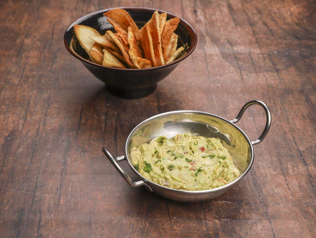 Spicy Pita & Guacamole · Spicy pita chips served with our guacamole.