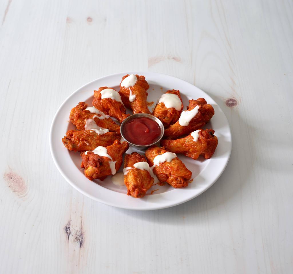 Buffalo Wings · Zesty chicken wings served in your choice of sauce with bleu cheese
