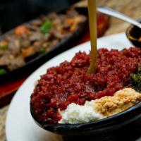 Kitto  · Special chopped up ground beef mixed with butter and rare, medium or well done.
