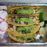 Crunchy tacos  grilled chicken  (4) · Lettuce, onion, cilantro, green sauce , lemon and radish 