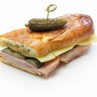 Smokin Cubano Special Sandwich · Pulled pork, ham, Swiss, pickles, mustard, and mayo on a Portuguese roll.