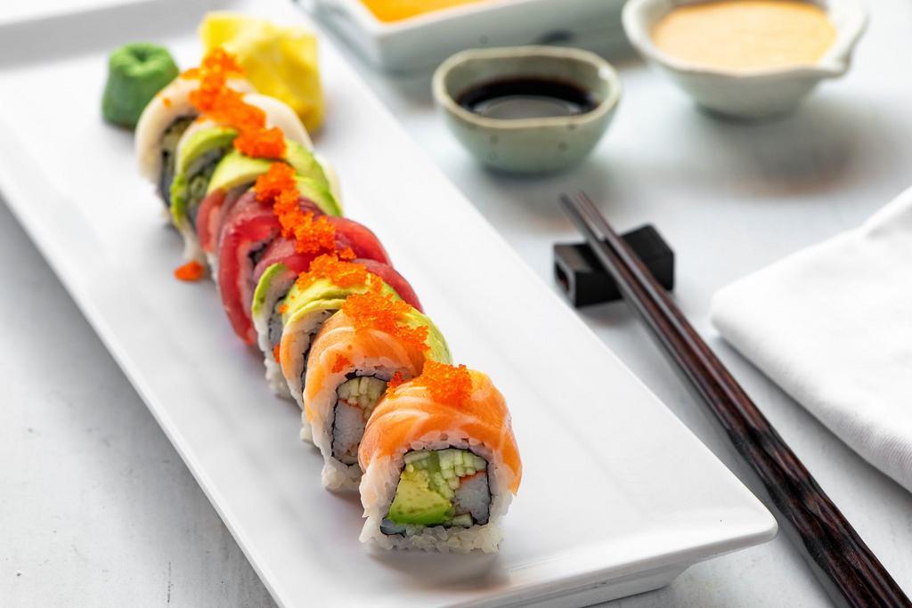 Rainbow · Tuna, salmon, white fish, avocado and masago over a California roll