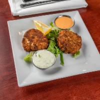 Maryland Crab Cakes · Crab, Shrimp & Scallop cakes served with tarter sauce & chipotle aioli.