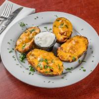 Loaded Potato Skins · Served with bacon & cheddar.