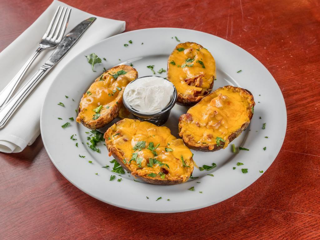 Loaded Potato Skins · Served with bacon & cheddar.