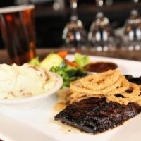 Sonny's Char Grilled Marinated Skirt Steak · Prepared in our special house marinade, served with garlic mash & mixed vegetables.