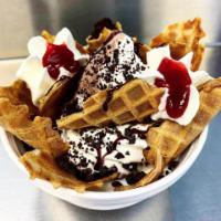 Ice Cream Nachos · Vanilla and chocolate twist soft serve with chocolate sauce and chocolate crunch, along with...