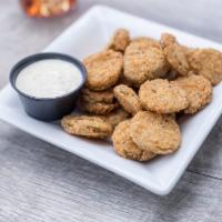 Fried Pickles · Breaded and Southern fried pickle chips. Served with ranch dressing.