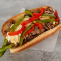 Grilled Pepper Cheesesteak · 8” Philly cheesesteak loaded with grilled steak, melted cheese, and grilled bell peppers on ...