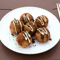 A4. Takoyaki · 6 pieces. Fried squid balls.
