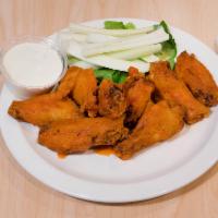 Wings · One pound of wings served with celery strips.