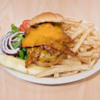 Bacon and Cheddar Cheeseburger · Made with 1/2 pound of fresh Angus beef, prepared medium to well done and served with our se...