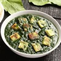 Palak Paneer · Cottage cheese and spinach curry.