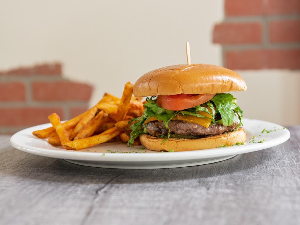 Black Angus Burger · Mayo, mustard, romaine, grilled onions, tomatoes, dill pickles, and cheddar cheese.